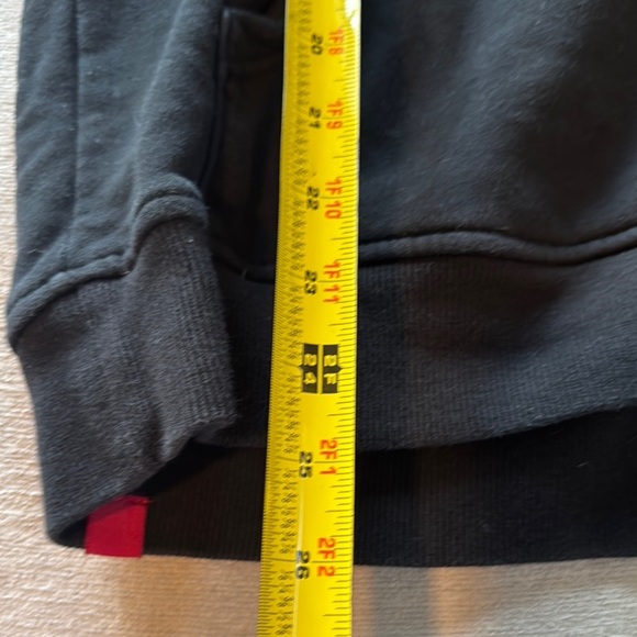 Mostly Heard Rarely Seen Black and Yellow Cartoon Graphic Sweater - Picture 13 of 14